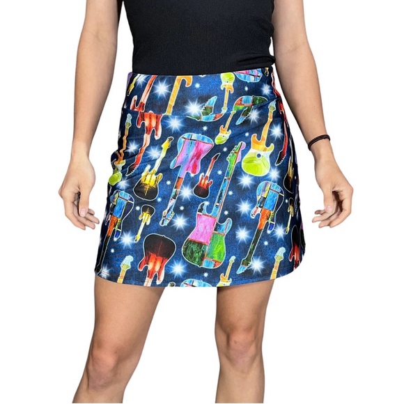 smash dandy Dresses & Skirts - Smash Dandy Women’s Guitar Print Flutter Golf Skort Size Small